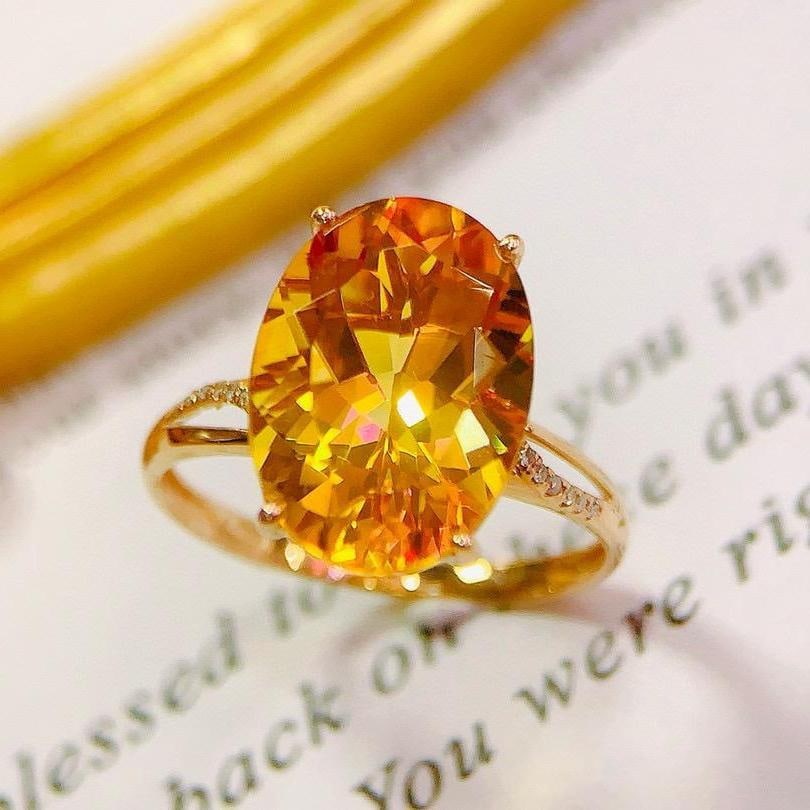 14k Gold 5.35 Ctw Natural Citrine & Diamond Ring: Ref:231153144 // gold content:14k gold // ring size:7. 25us // // main gemstone:citrine // shape:oval // carat weight:5. 3ct // color:yellow // treatment:natural // // adjacent gemstone 2 : diamond