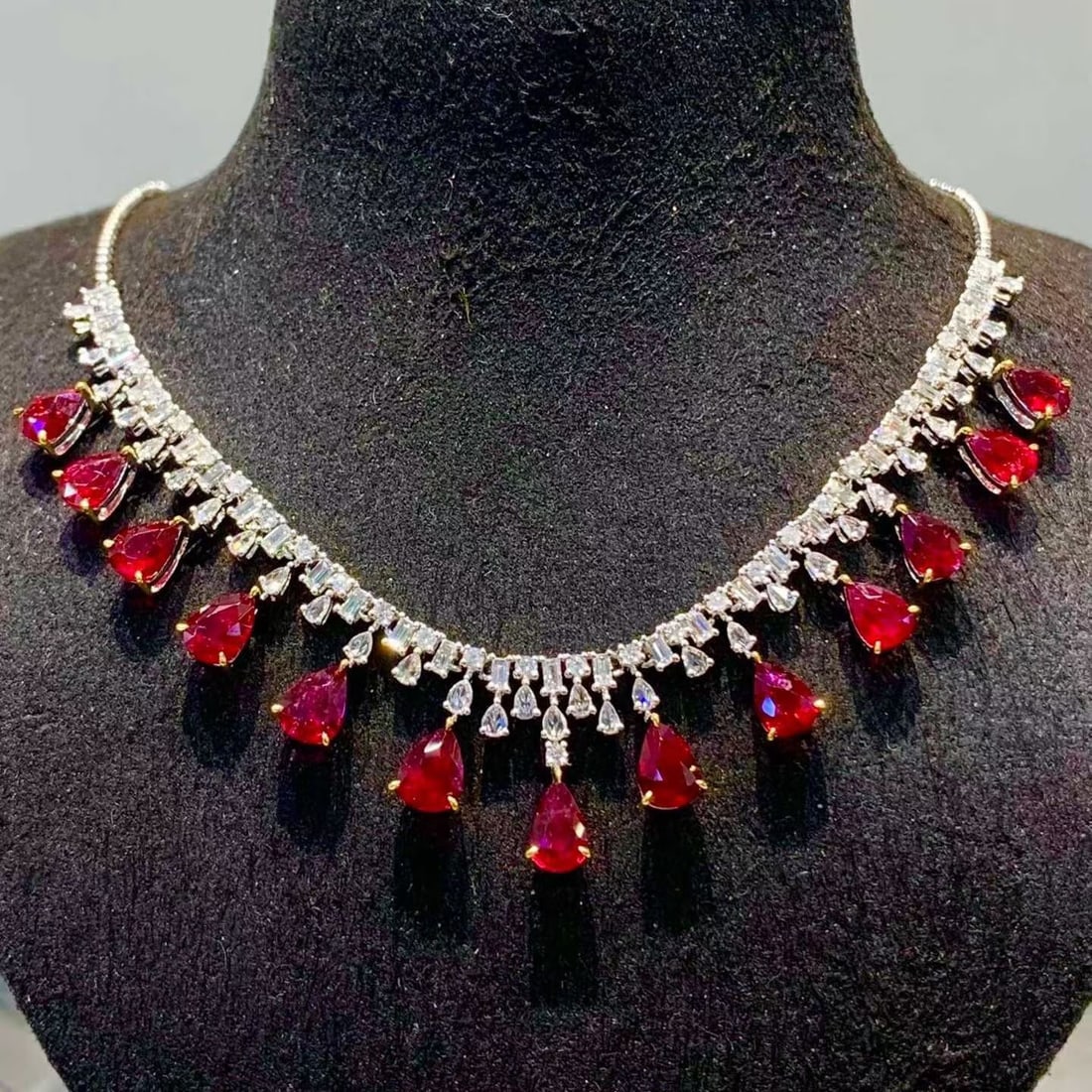 14k Gold 7.2 Ct Natural Ruby & Diamond Necklace: Ref:231169082 // gold content:14k gold // main gemstone:ruby // number of stones:13 // shape:pear // carat weight:7. 2ct // color:pigeonblood red // treatment:natural // // adjacent gemstone 2 : diamo