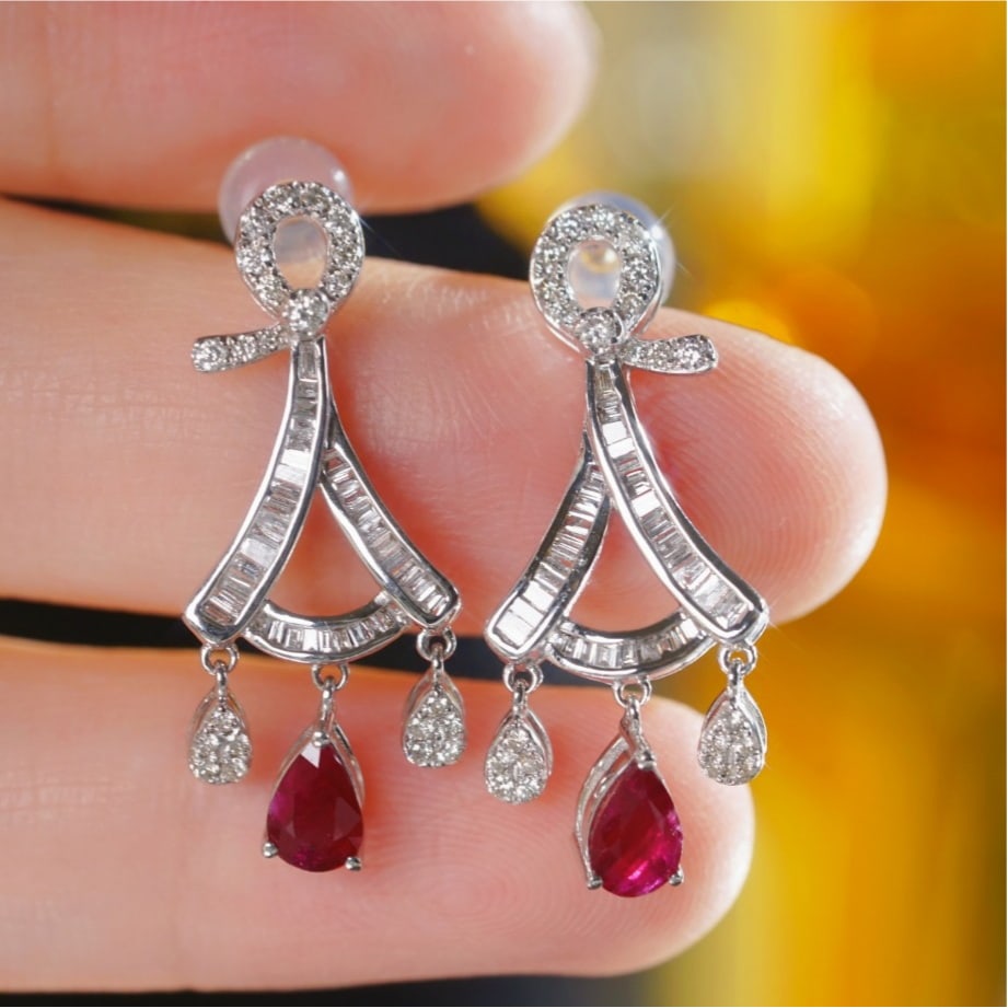 14k Gold 1.60 Ctw Natural Ruby & Diamond Earrings: Ref:231169085 // gold content:14k gold // main gemstone:ruby // number of stones:2 // shape:pear // carat weight:0. 90ct // color:red // treatment:natural // // adjacent gemstone 2 : diamond //
