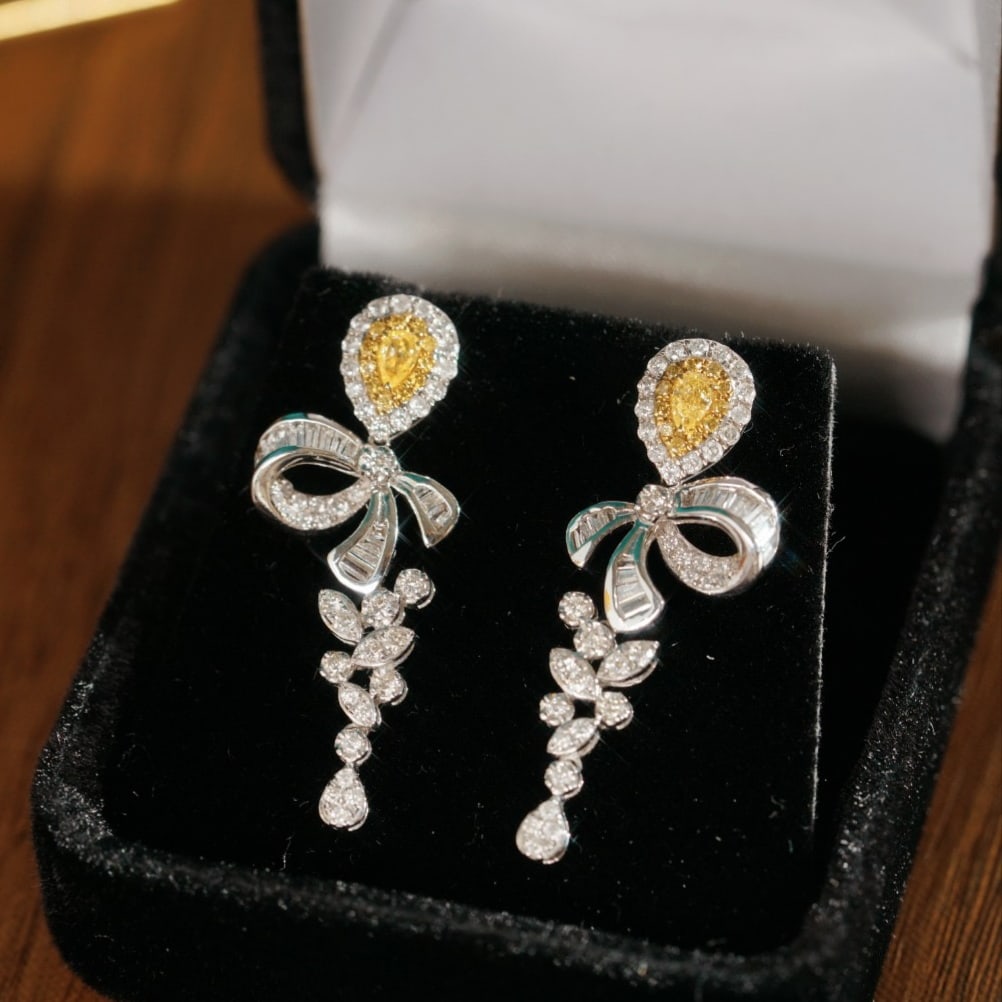14k Gold 1.20 Ctw Natural Yellow Diamond & Diamond Earrings: Ref:231169096 // gold content:14k gold // main gemstone:yellow diamond // shape:pear // carat weight:0. 26ct // color:yellow // treatment:natural // // adjacent gemstone 2 : diamond // shape:multiple 