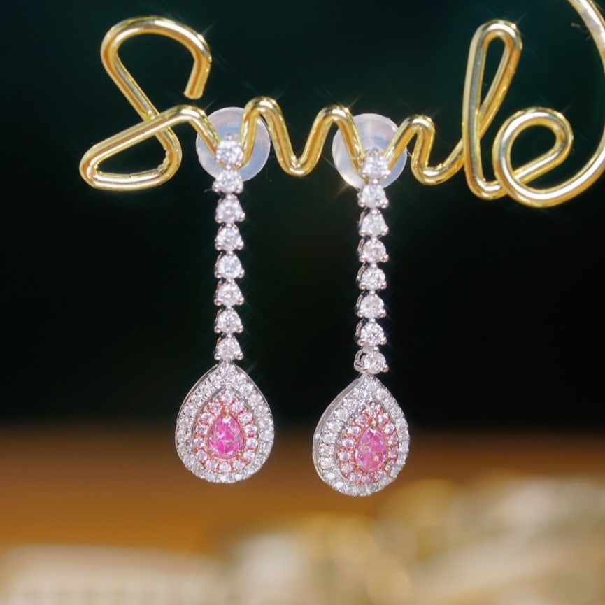 14k Gold 1.00 Ctw Natural Pink Diamond & Diamond Earrings: Ref:231169098 // gold content:14k gold // main gemstone:pink diamond // shape:pear // carat weight:0. 24ct // color:pink // treatment:natural // // adjacent gemstone 2 : diamond // shape:round //
