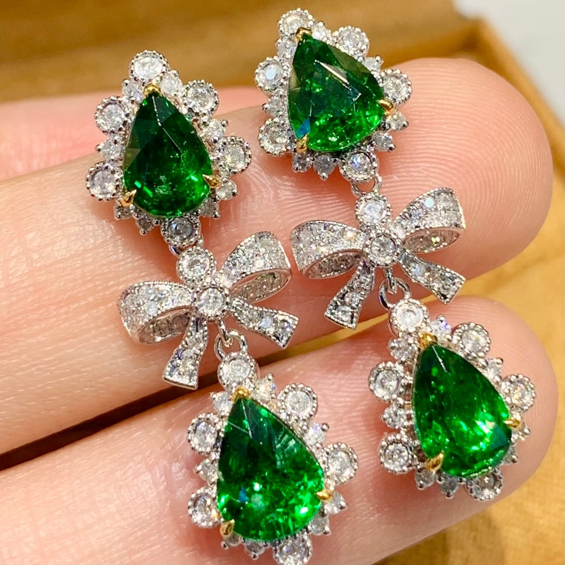14k Gold 4.2 Ct Vivid Green Natural Tsavorite & Diamond Earrings: Ref:231169132 // gold content:14k gold // main gemstone:tsavorite // shape:pear // carat weight:4. 2ct // color:vivid green // treatment:natural // // adjacent gemstone 2 : diamond // shape:round //