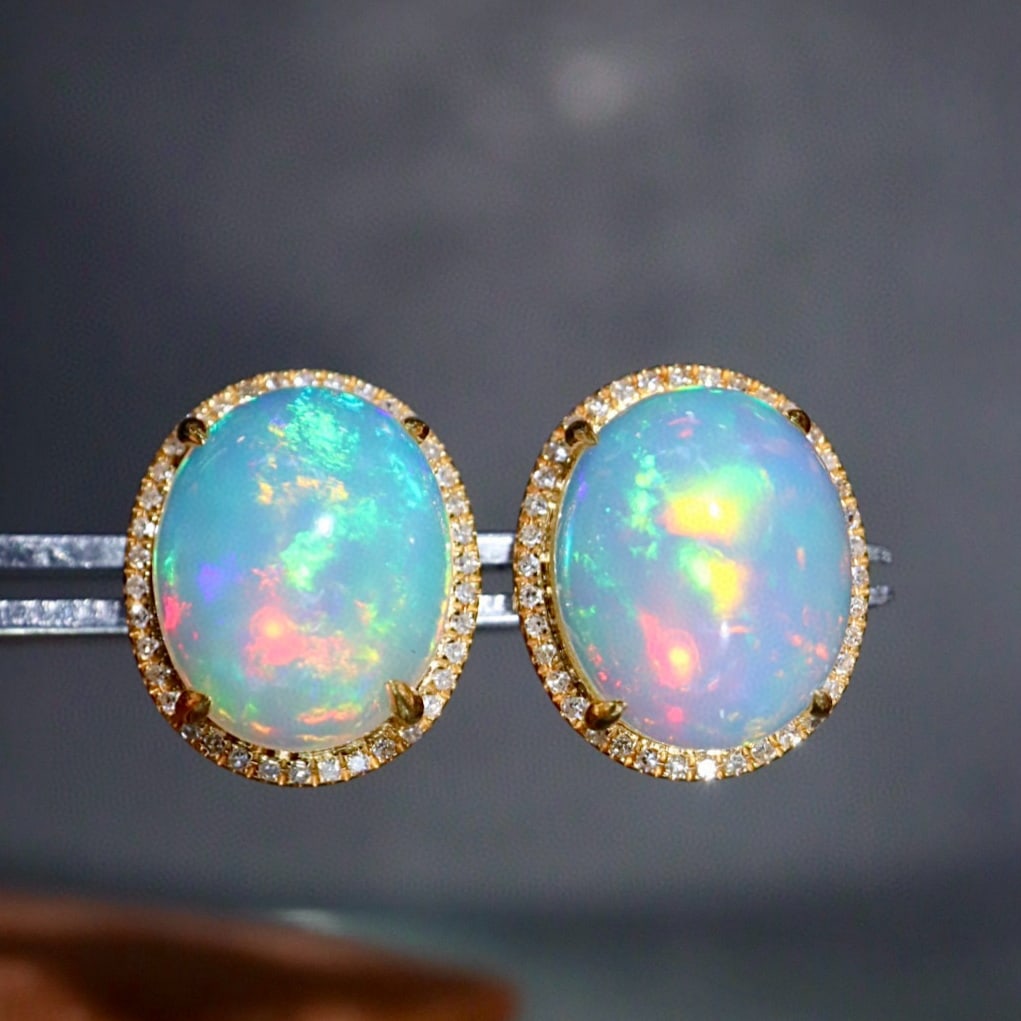 14k Gold 5.03 Ctw Natural Opal & Diamond Earrings: Ref:231169135 // gold content:14k gold // main gemstone:opal // shape:oval // carat weight:4. 8ct // color:color // treatment:natural // // adjacent gemstone 2 : diamond // shape:round // carat weight