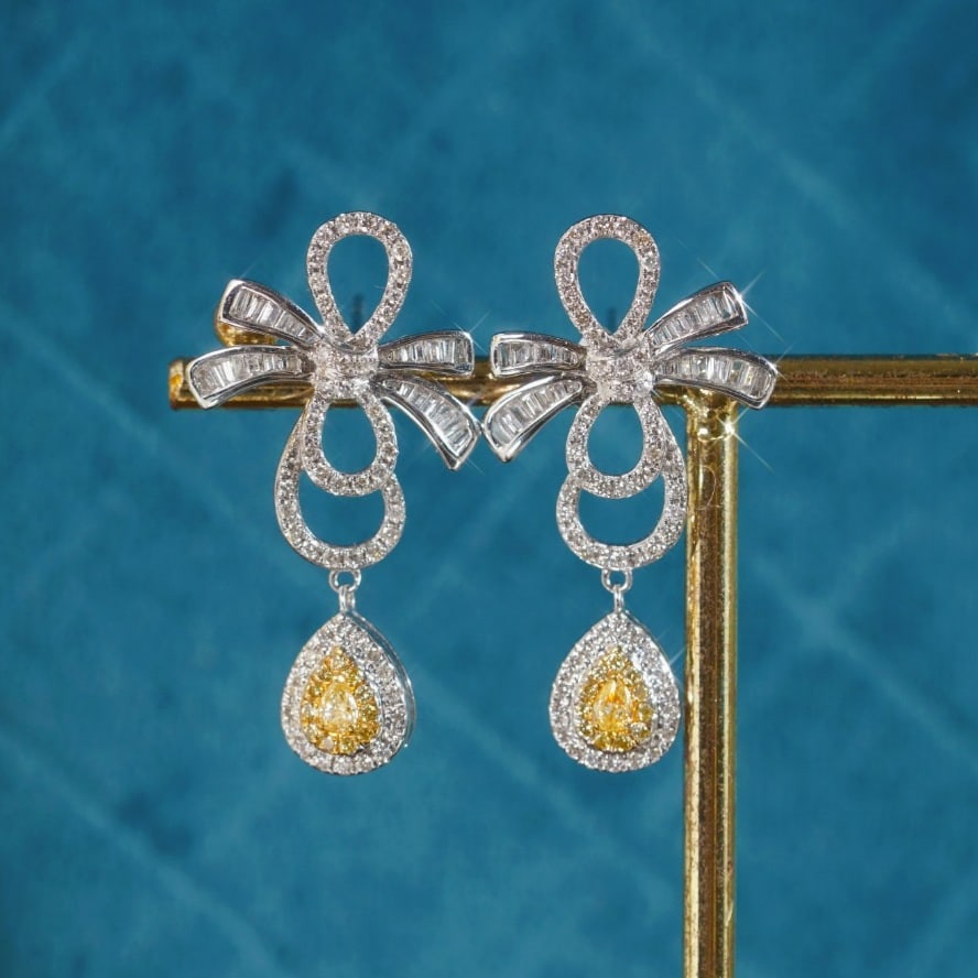 14k Gold 1.10 Ctw Natural Yellow Diamond & Diamond Earrings: Ref:231169147 // gold content:14k gold // main gemstone:yellow diamond // shape:pear // carat weight:0. 18ct // color:yellow // treatment:natural // // adjacent gemstone 2 : diamond // shape:multiple 