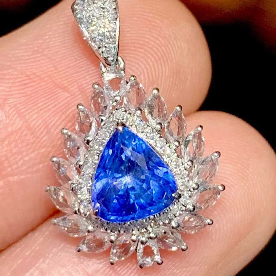 14k Gold 1.25 Ct Natural Sapphire & Sapphire & Diamond Pendant( Without Chain ): Ref:231169220 // gold content:14k gold // main gemstone:sapphire // shape:pear // carat weight:1. 25ct // color:blue // treatment:natural // // adjacent gemstone 2 : sapphire // shape:multiple //