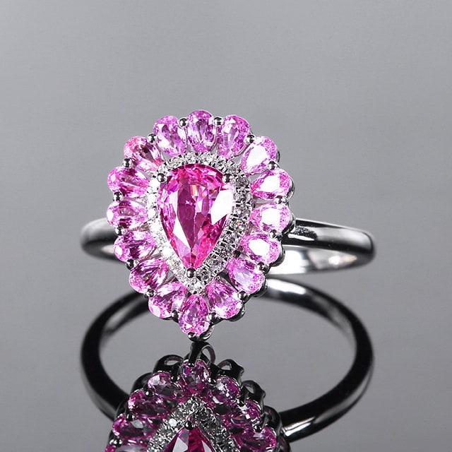 14k Gold 1.91 Ctw Natural Sapphire & Diamond Ring: Ref:231170027 // gold content:14k gold // ring size:7. 25us // // main gemstone:sapphire // shape:pear // carat weight:1. 84ct // color:pink // treatment:natural // // adjacent gemstone 2 : diamond