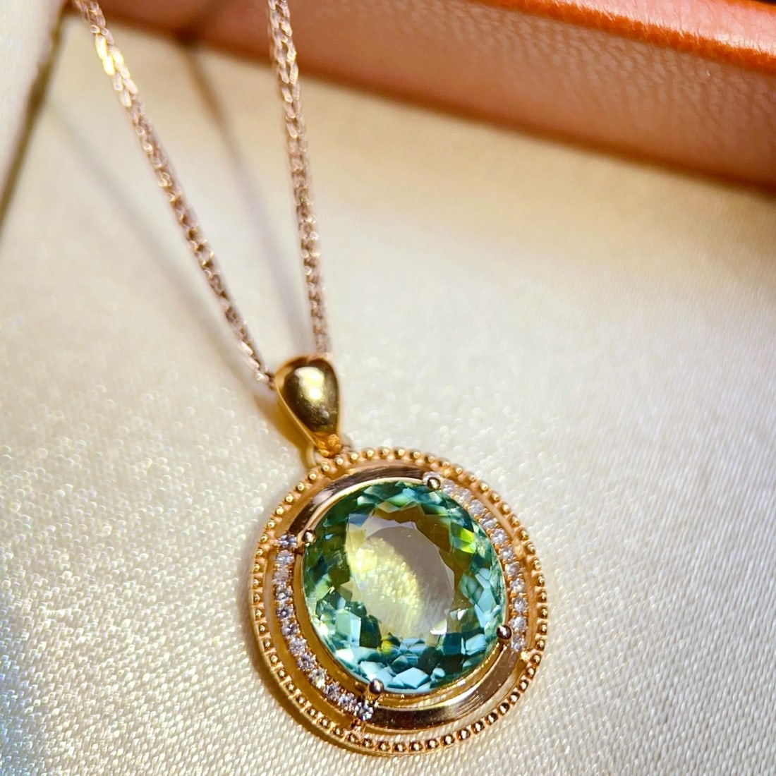 14k Gold 3.57 Ctw Natural Tourmaline & Diamond Pendant( Without Chain ): Ref:231170044 // gold content:14k gold // main gemstone:tourmaline // shape:oval // carat weight:3. 5ct // color:green // treatment:natural // // adjacent gemstone 2 : diamond // number of stones:24