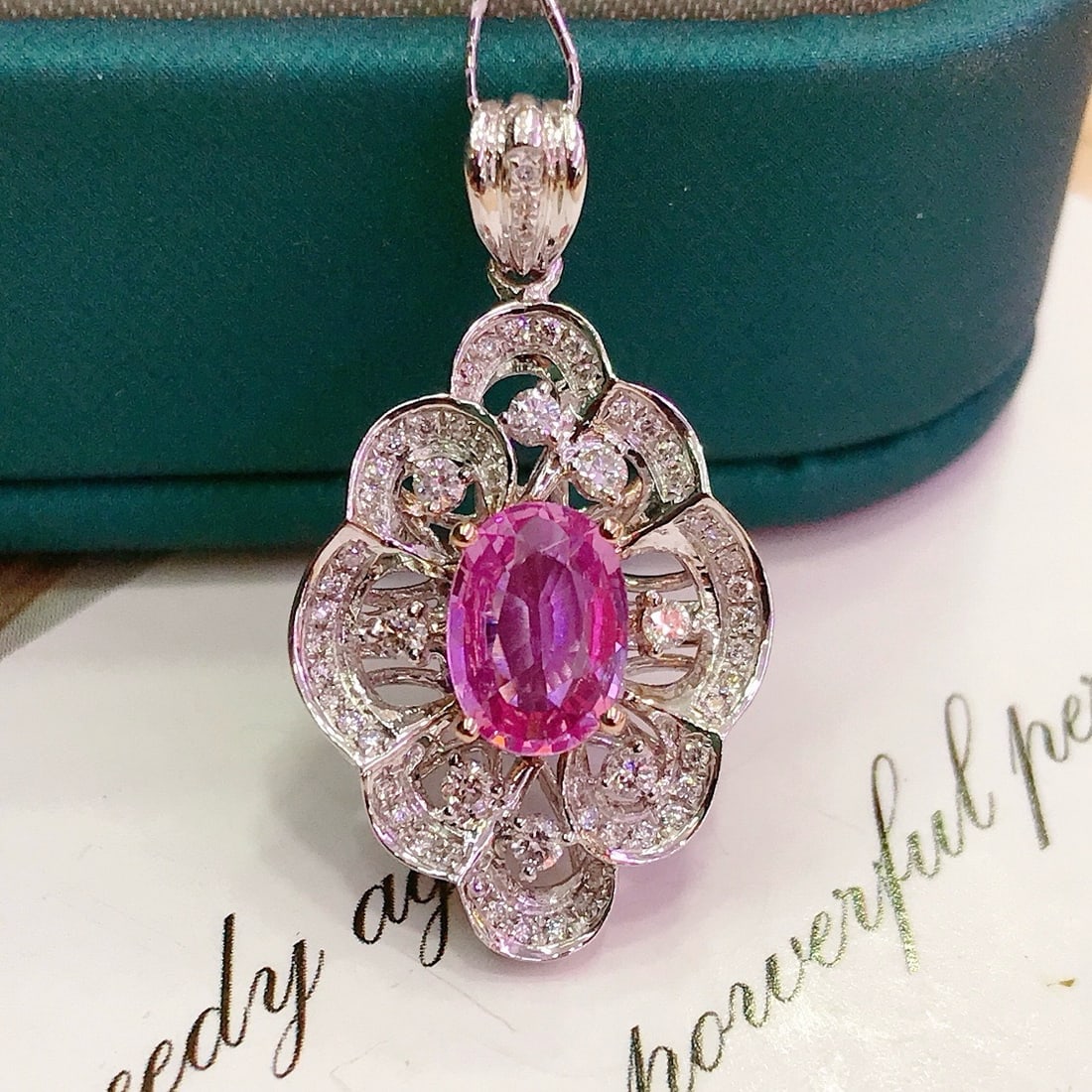 14k Gold 0.9 Ct Natural Sapphire & Diamond Pendant( Without Chain ): Ref:231170084 // gold content:14k gold // main gemstone:sapphire // shape:oval // carat weight:0. 9ct // color:pink // treatment:natural // // adjacent gemstone 2 : diamond // number of stones:58 //