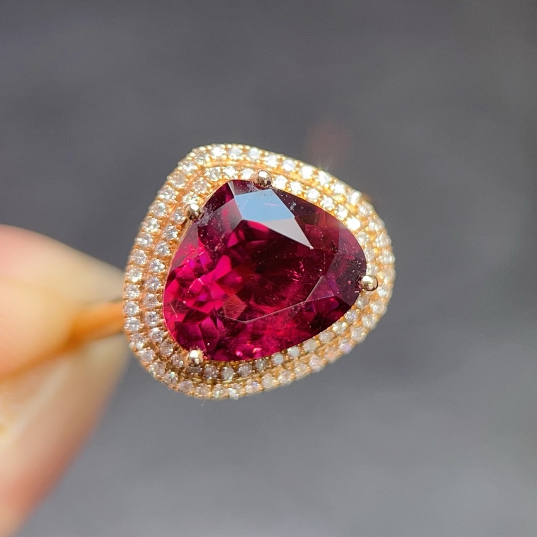 14k Gold 3.75 Ctw Natural Tourmaline & Diamond Ring: Ref:231170097 // gold content:14k gold // ring size:7. 25us // // main gemstone:tourmaline // shape:pear // carat weight:3. 5ct // color:red // treatment:natural // // adjacent gemstone 2 : diamond