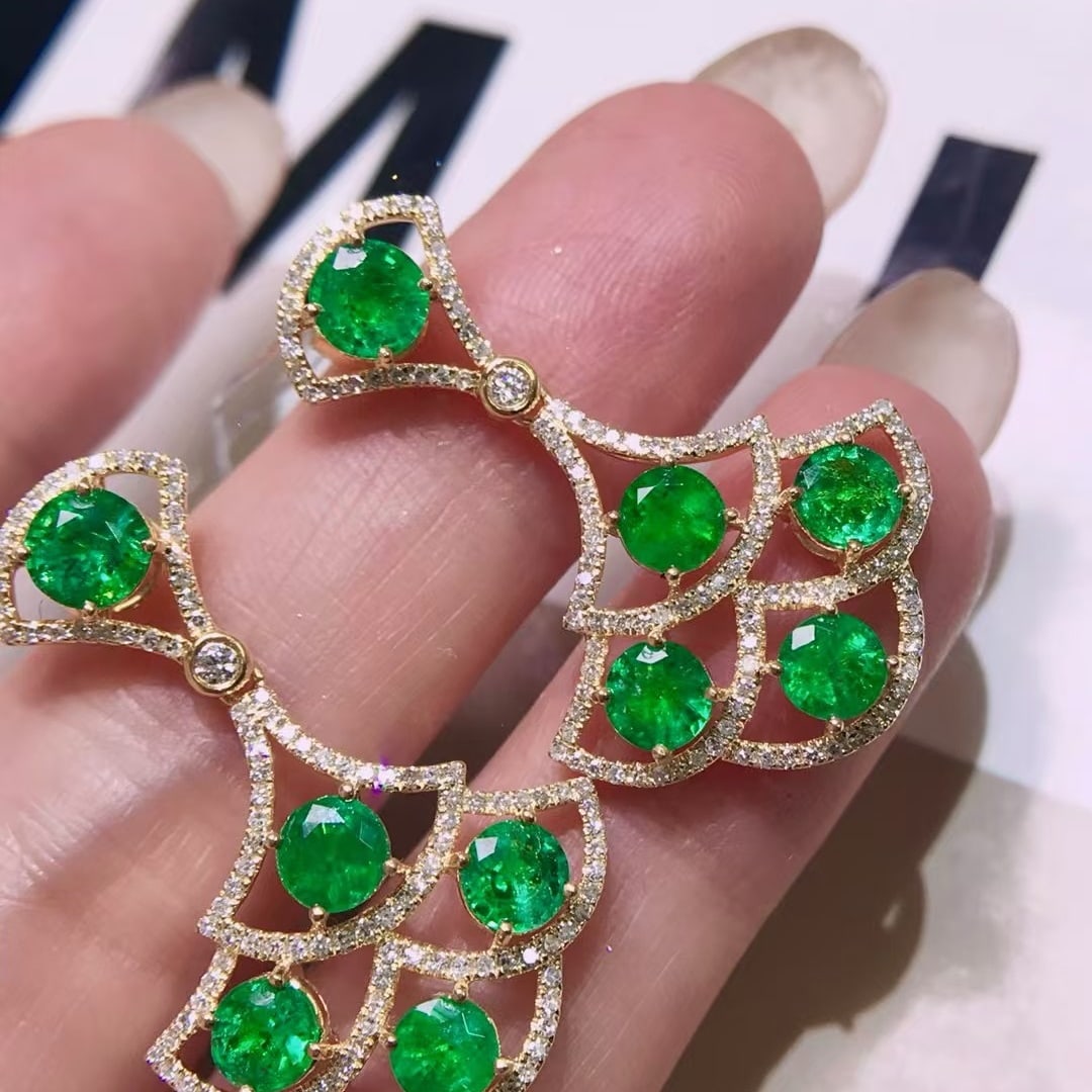 14k Gold 4.34 Ctw Natural Emerald & Diamond Earrings: Ref:231170107 // gold content:14k gold // main gemstone:emerald // shape:round // carat weight:3. 5ct // color:green // treatment:natural // cut grade:g // // adjacent gemstone 2 : diamond // shape:ro