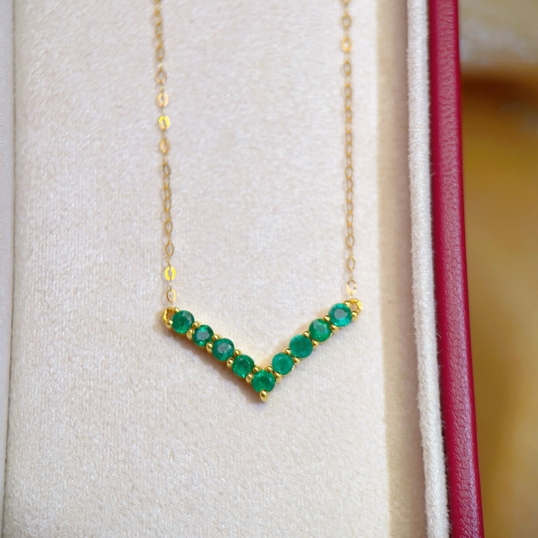 14k Gold 0.7 Ct Natural Emerald Necklace: Ref:231170115 // gold content:14k gold // main gemstone:emerald // shape:round // carat weight:0. 7ct // color:green // treatment:natural // cut grade:g // Condition: New Low Estimate: 1700.00 High Es