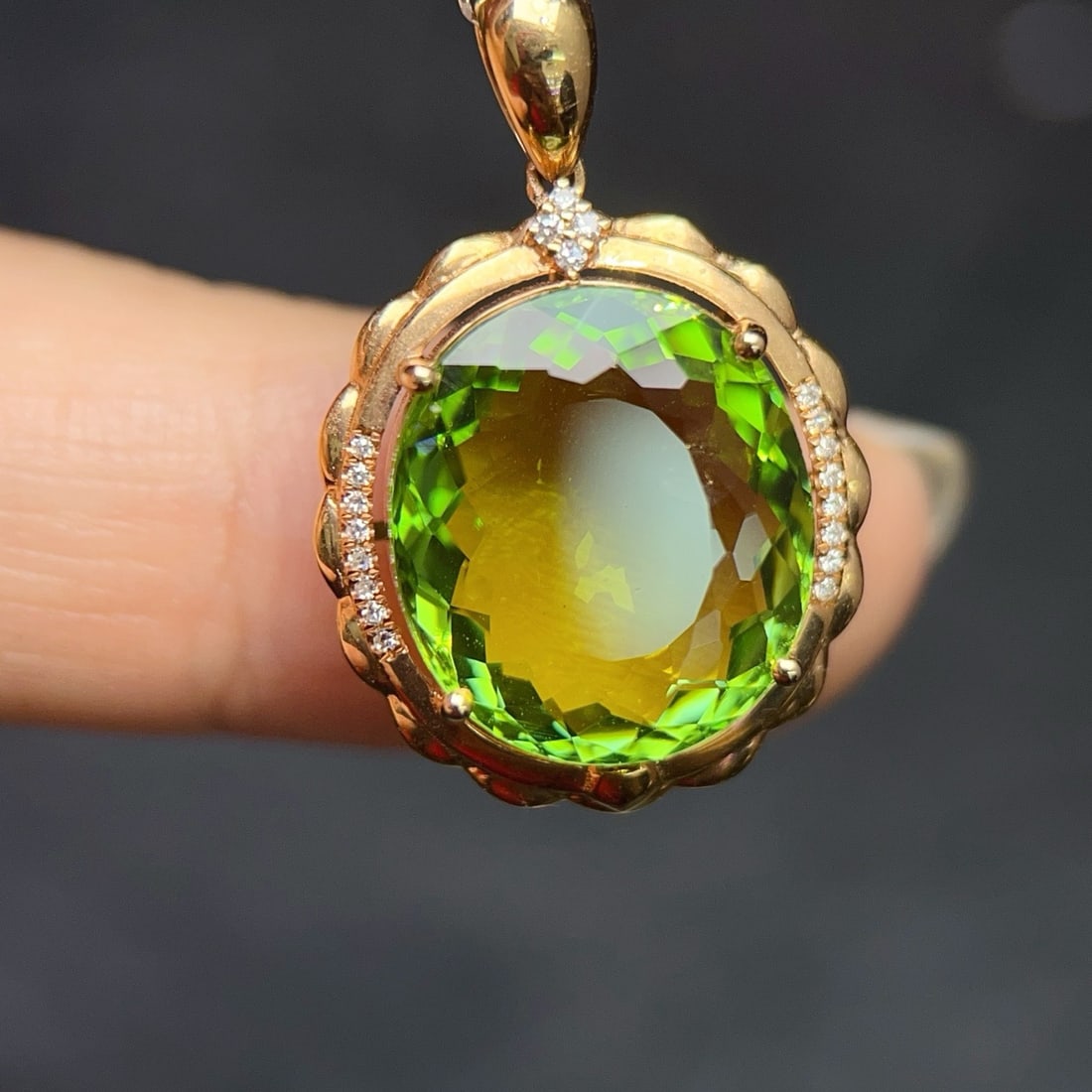 14k Gold 9.22 Ctw Natural Tourmaline & Diamond Pendant( Without Chain ): Ref:231170141 // gold content:14k gold // main gemstone:tourmaline // shape:oval // carat weight:9. 15ct // color:green // treatment:natural // // adjacent gemstone 2 : diamond // number of stones:20