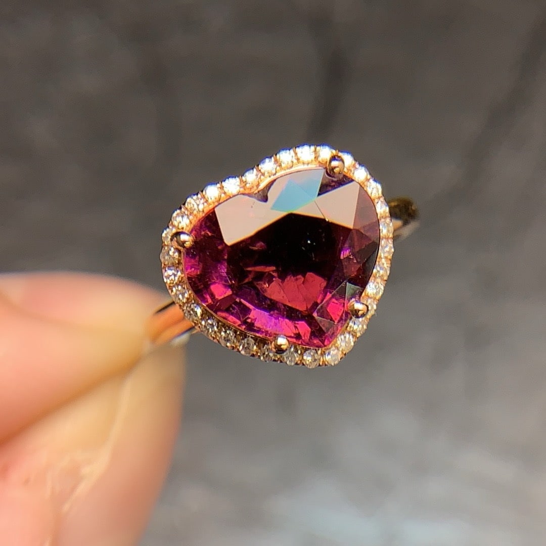 14k Gold 3.84 Ctw Natural Tourmaline & Diamond Ring: Ref:231170142 // gold content:14k gold // ring size:7. 25us // // main gemstone:tourmaline // shape:heart // carat weight:3. 68ct // color:red // treatment:natural // // adjacent gemstone 2 : diamond