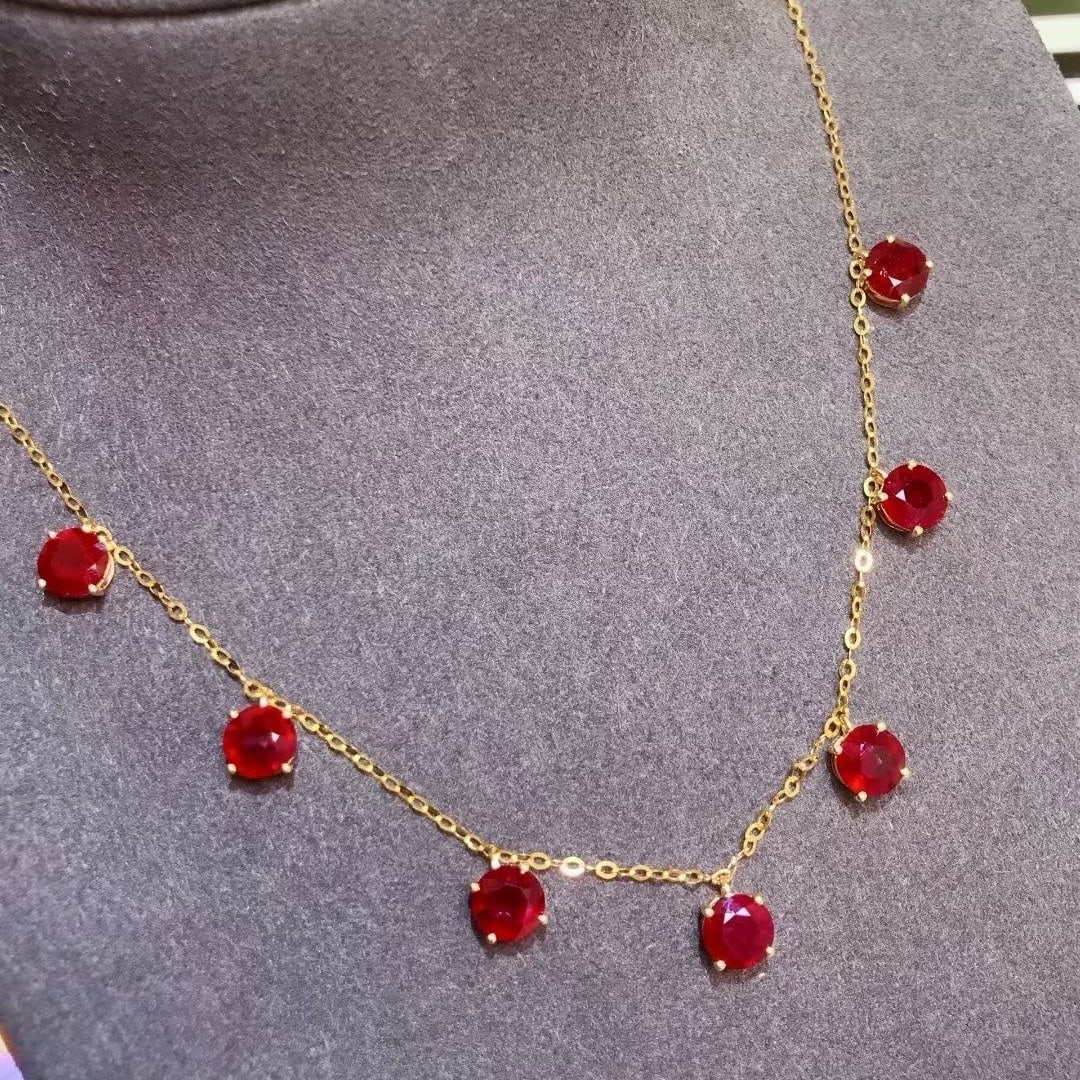 14k Gold 6.2 Ct Vivid Red Natural Ruby Necklace: Ref:231170148 // gold content:14k gold // main gemstone:ruby // shape:round // carat weight:6. 2ct // color:vivid red // treatment:natural // cut grade:g // Condition: New Low Estimate: 5500.00 High