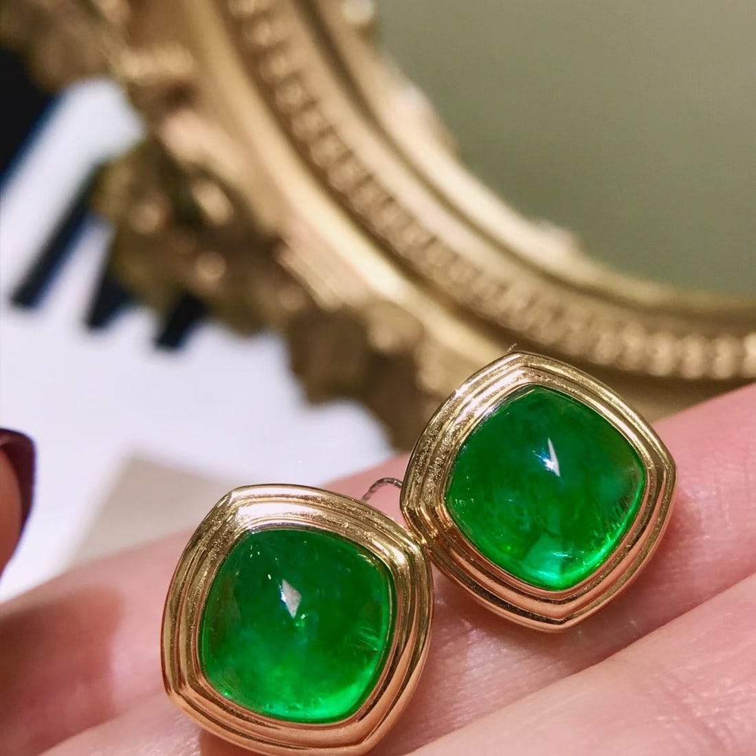 14k Gold 5.2 Ct Natural Emerald Earrings: Ref:231170162 // gold content:14k gold // main gemstone:emerald // shape:sugar-loaf // carat weight:5. 2ct // color:green // treatment:natural // Condition: New Low Estimate: 7300.00 High Estimate: 11