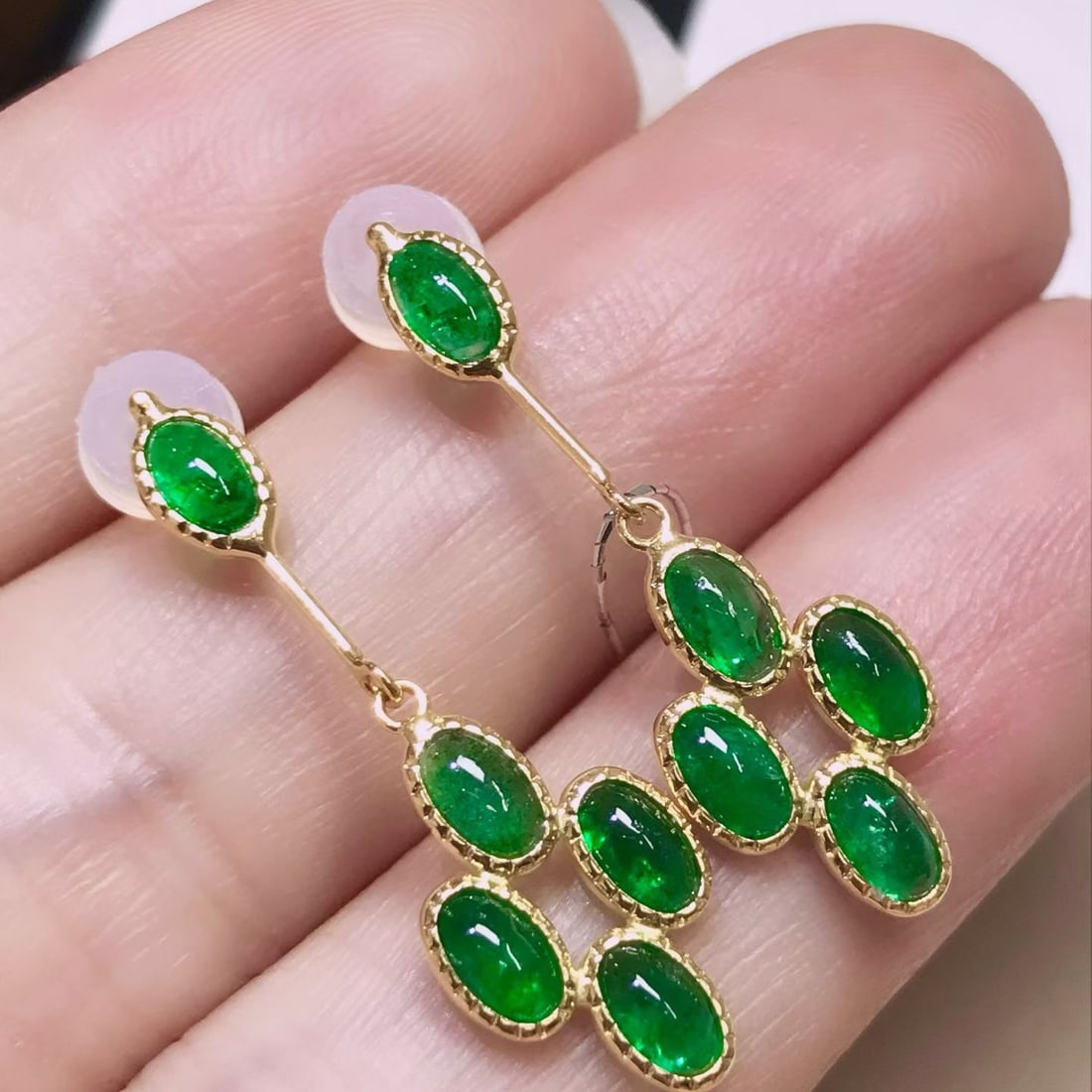 14k Gold 2.61 Ct Natural Emerald Earrings: Ref:231170183 // gold content:14k gold // main gemstone:emerald // shape:oval // carat weight:2. 61ct // color:green // treatment:natural // Condition: New Low Estimate: 2000.00 High Estimate: 3000.00