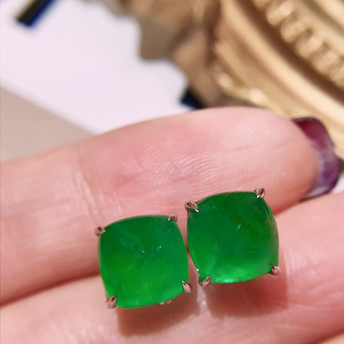 14k Gold 5.7 Ct Natural Emerald Earrings: Ref:231170187 // gold content:14k gold // main gemstone:emerald // shape:sugar-loaf // carat weight:5. 7ct // color:green // treatment:natural // Condition: New Low Estimate: 5500.00 High Estimate: 83