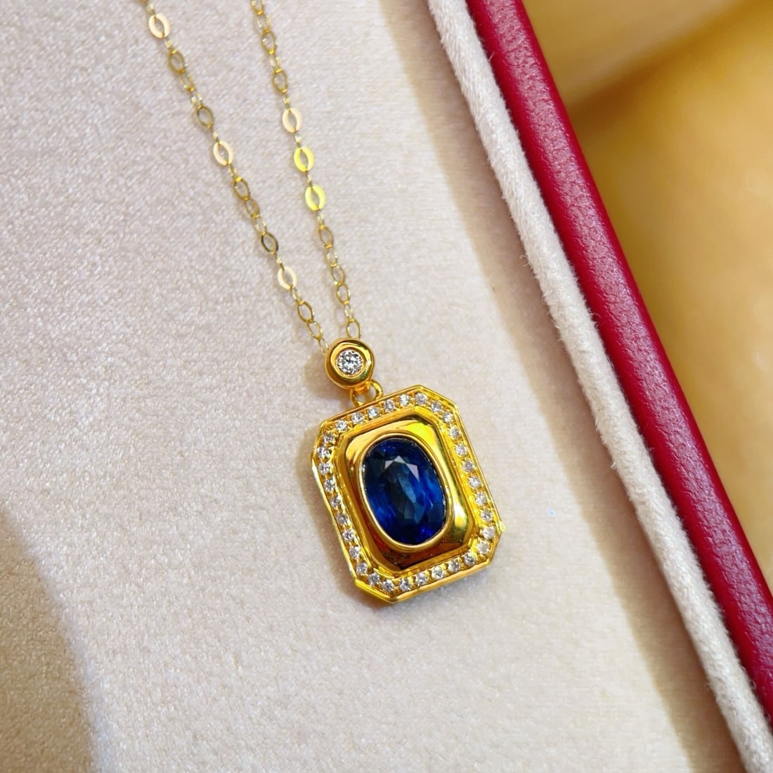 14k Gold 0.9 Ct Natural Sapphire & Diamond Pendant( Without Chain ): Ref:231170199 // gold content:14k gold // main gemstone:sapphire // shape:oval // carat weight:0. 9ct // color:blue // treatment:natural // // adjacent gemstone 2 : diamond // number of stones:31 //