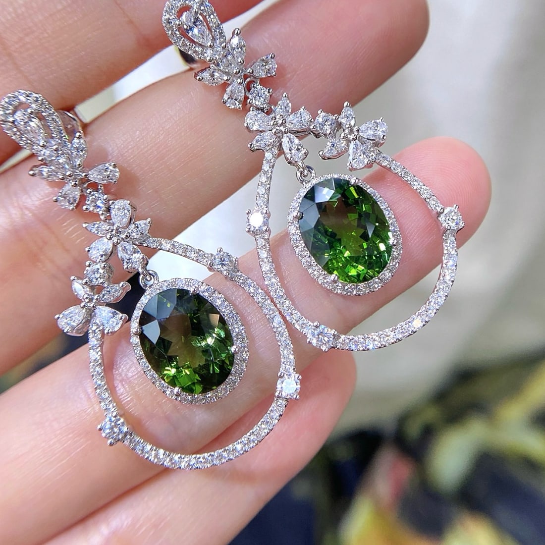 14k Gold 7.75 Ctw Natural Tourmaline & Diamond Earrings: Ref:231170234 // gold content:14k gold // main gemstone:tourmaline // shape:oval // carat weight:4. 18ct // color:green // treatment:natural // // adjacent gemstone 2 : diamond // shape:multiple // ca