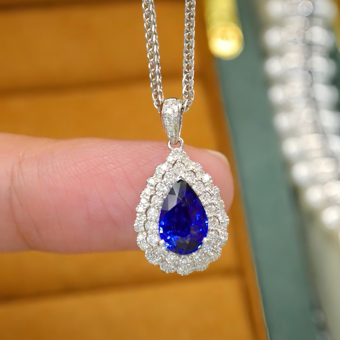 14k Gold 1.32 Ctw Natural Sapphire & Diamond Pendant( Without Chain ): Ref:231170241 // gold content:14k gold // main gemstone:sapphire // shape:pear // carat weight:1. 03ct // color:blue // treatment:natural // // adjacent gemstone 2 : diamond // number of stones:55 //