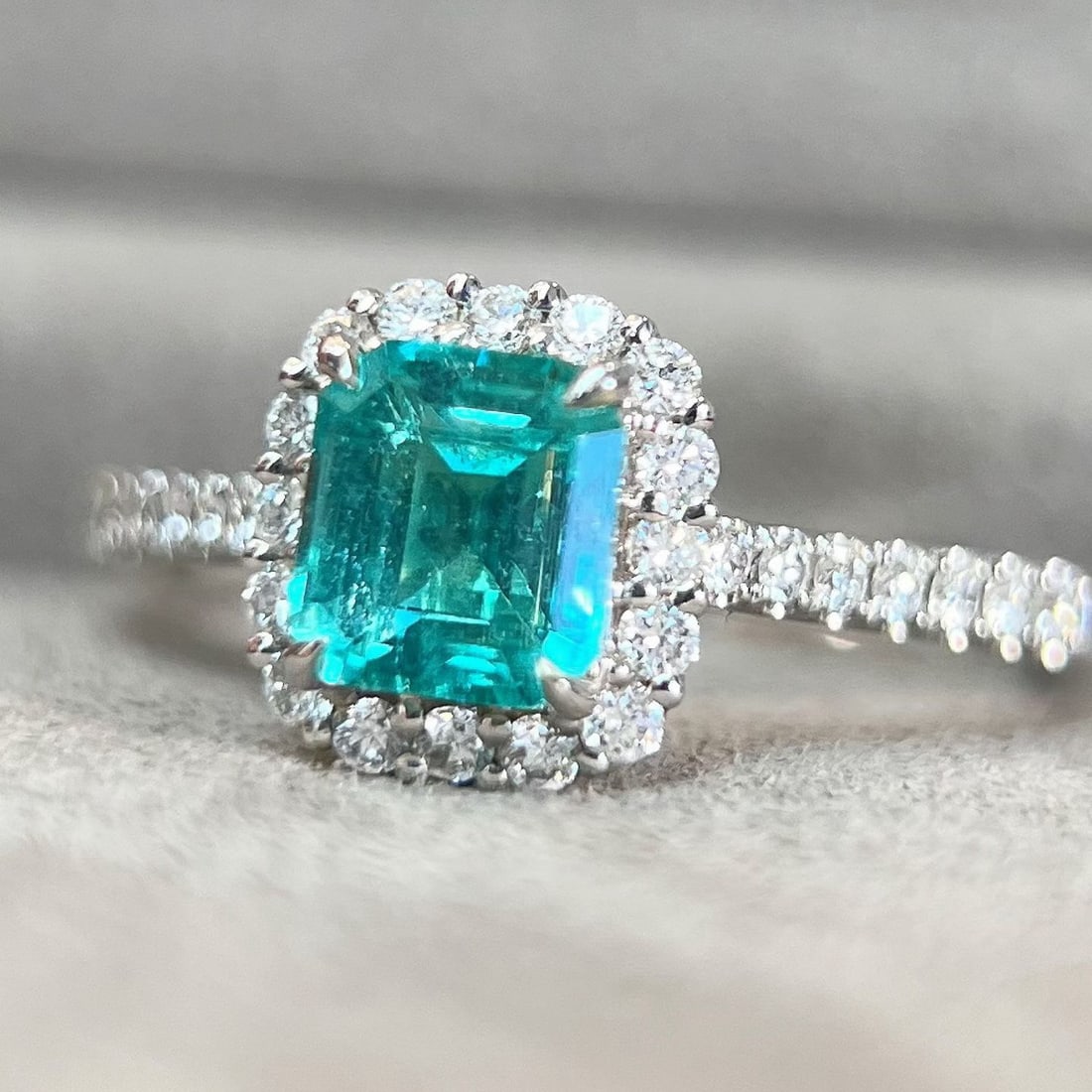 14k Gold 1.22 Ctw Natural Paraiba Tourmaline & Diamond Ring: Ref:231170250 // gold content:14k gold // ring size:7. 25us // // main gemstone:paraiba tourmaline // shape:octagonal // carat weight:0. 93ct // color:neon blue // treatment:natural // // adjacent gem