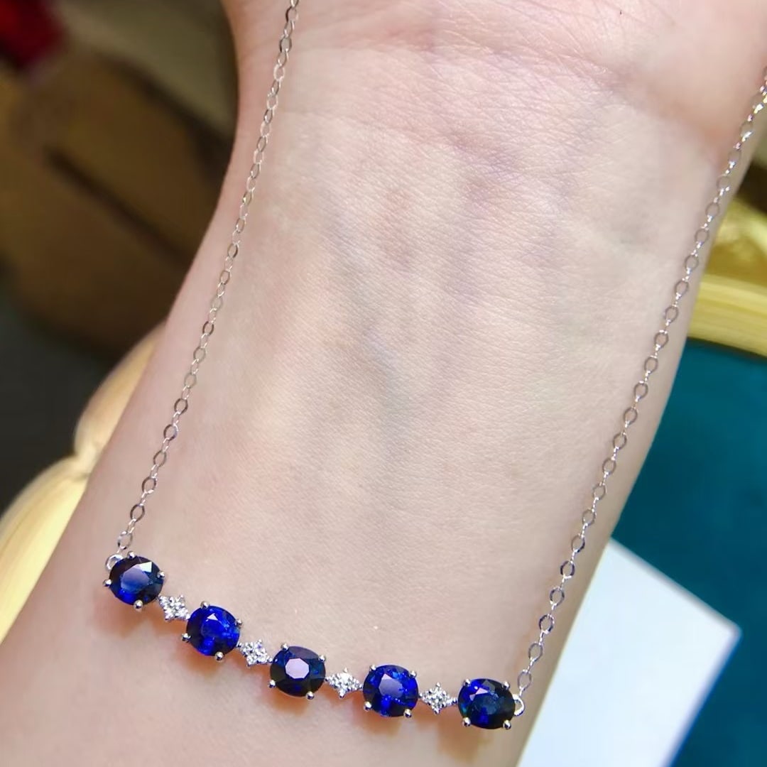 14k Gold 2.45 Ct Natural Sapphire & Diamond Necklace: Ref:231170265 // gold content:14k gold // main gemstone:sapphire // shape:oval // carat weight:2. 45ct // color:blue // treatment:natural // // adjacent gemstone 2 : diamond // number of stones:16 //