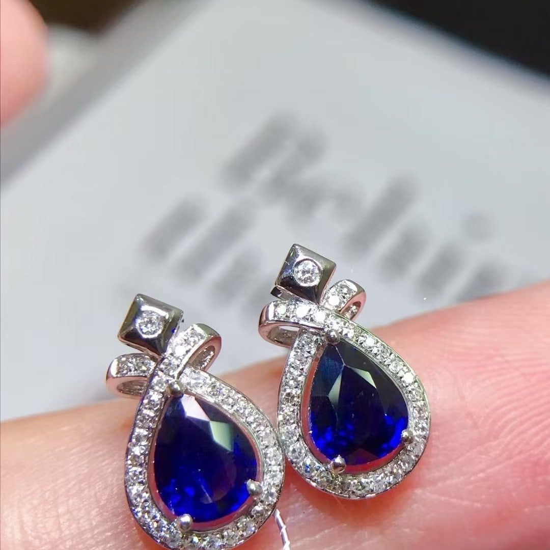 14k Gold 1.55 Ctw Natural Sapphire & Diamond Earrings: Ref:231170283 // gold content:14k gold // main gemstone:sapphire // shape:pear // carat weight:1. 35ct // color:blue // treatment:natural // // adjacent gemstone 2 : diamond // shape:round // carat