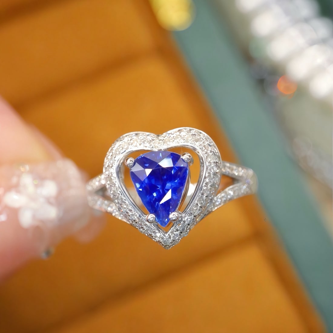 14k Gold 1.67 Ctw Natural Sapphire & Diamond Ring: Ref:231170288 // gold content:14k gold // ring size:7. 25us // // main gemstone:sapphire // shape:pear // carat weight:1. 28ct // color:royal blue // treatment:natural // // adjacent gemstone 2 :