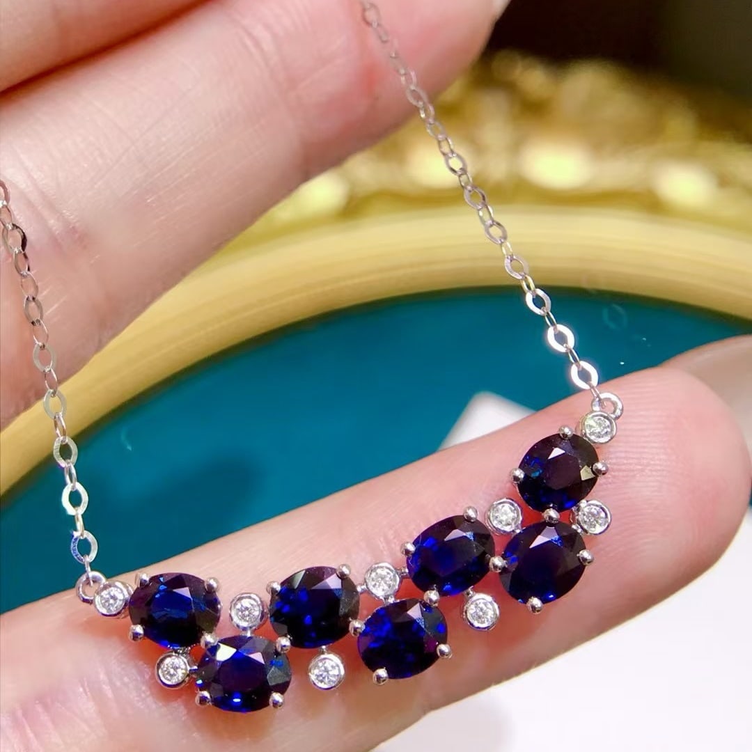 14k Gold 2.8 Ct Natural Sapphire & Diamond Necklace: Ref:231170301 // gold content:14k gold // main gemstone:sapphire // shape:oval // carat weight:2. 8ct // color:blue // treatment:natural // // adjacent gemstone 2 : diamond // number of stones:9 // sh