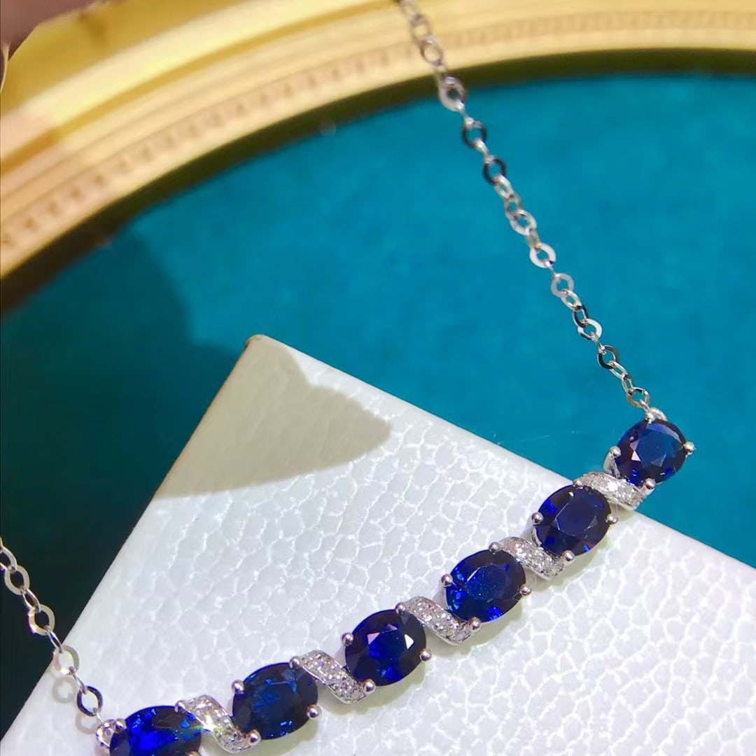 14k Gold 2.2 Ct Natural Sapphire & Diamond Necklace: Ref:231170336 // gold content:14k gold // main gemstone:sapphire // shape:oval // carat weight:2. 2ct // color:blue // treatment:natural // // adjacent gemstone 2 : diamond // number of stones:25 //