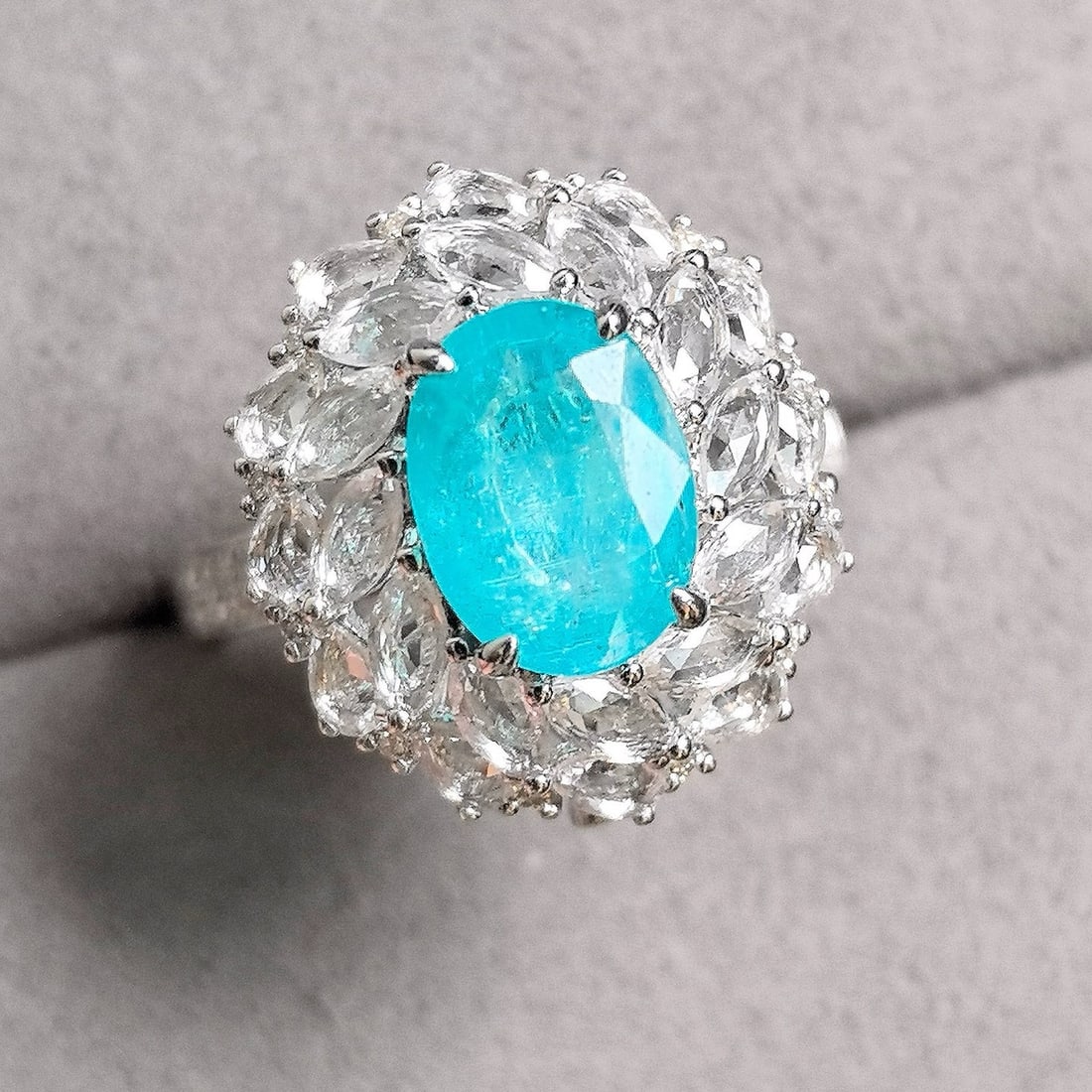 14k Gold 3.41 Ctw Natural Paraiba Tourmaline & Sapphire Ring: Ref:231170343 // gold content:14k gold // ring size:7. 25us // // main gemstone:paraiba tourmaline // shape:oval // carat weight:1. 92ct // color:neon blue // treatment:natural // // adjacent gemstone