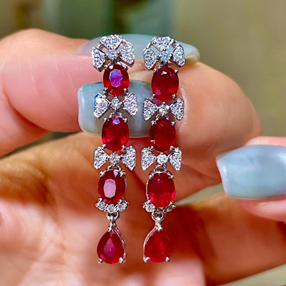 14k Gold 3.46 Ctw Natural Ruby & Diamond Earrings: Ref:231170355 // gold content:14k gold // main gemstone:ruby // shape:oval // carat weight:3. 19ct // color:red // treatment:natural // // adjacent gemstone 2 : diamond // shape:round // carat