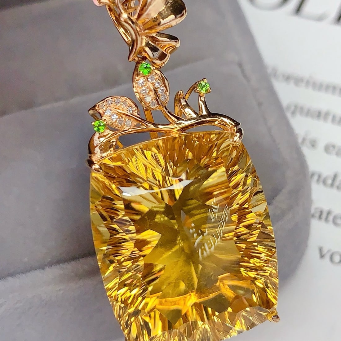 14k Gold 39.10 Ct Natural Citrine & Diamond Pendant( Without Chain ): Ref:231170414 // gold content:14k gold // main gemstone:citrine // shape:cushion // carat weight:39. 10ct // color:yellow // treatment:natural // // adjacent gemstone 2 : diamond // shape:round // cla