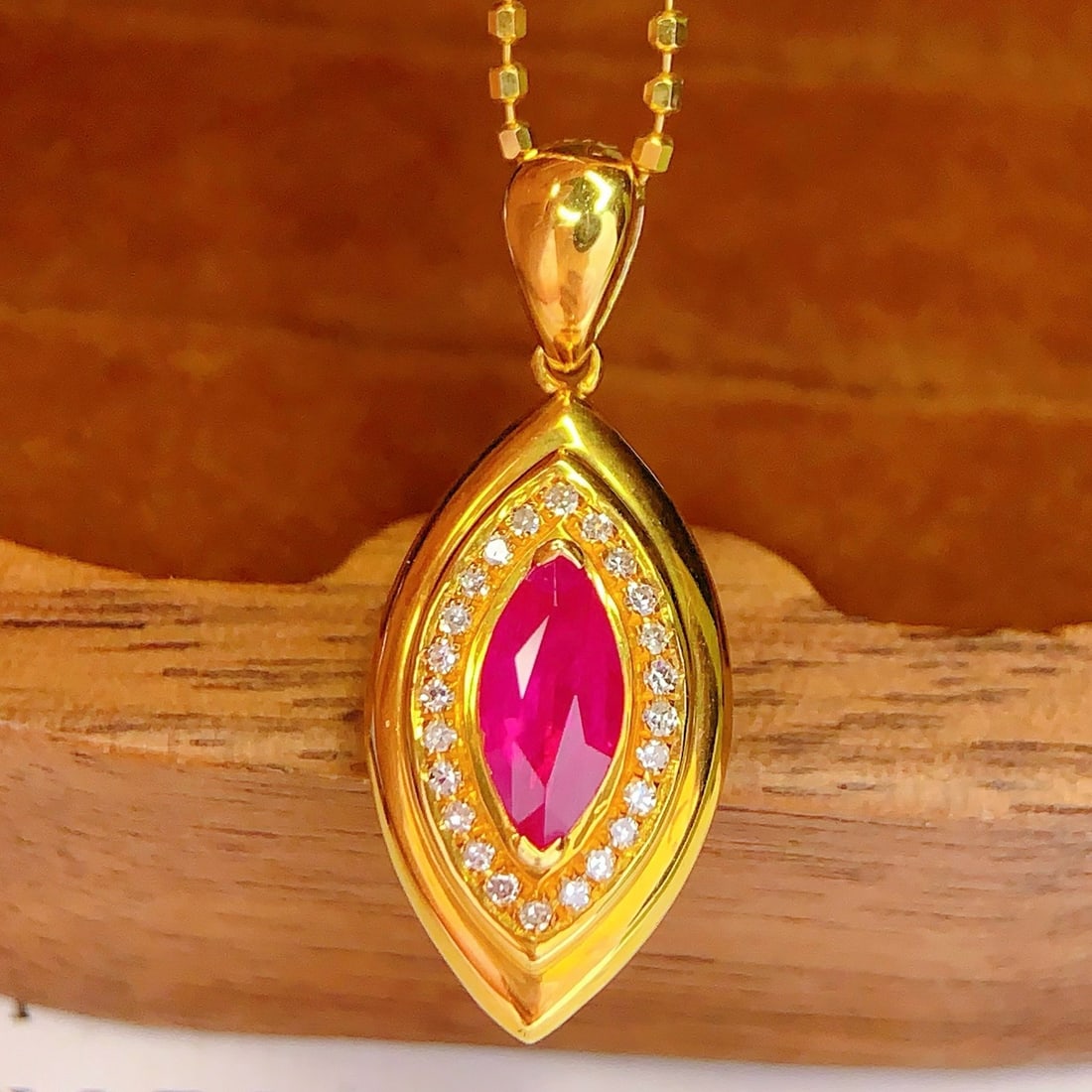 14k Gold 0.8 Ct Natural Ruby & Diamond Pendant( Without Chain ): Ref:231170419 // gold content:14k gold // main gemstone:ruby // shape:marquise // carat weight:0. 8ct // color:red // treatment:natural // // adjacent gemstone 2 : diamond // number of stones:24 //