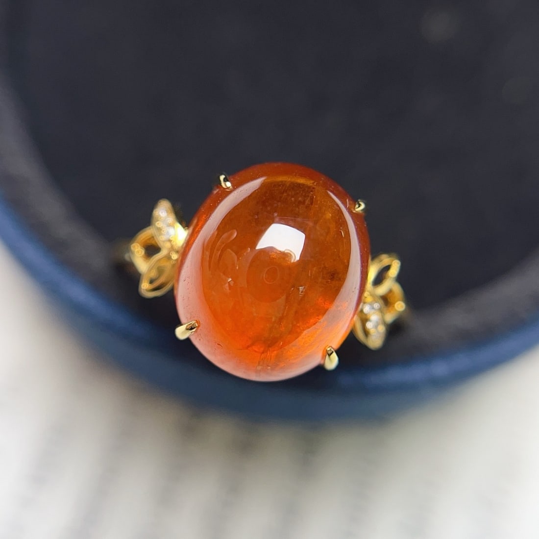 14k Gold 9.50 Ct Natural Spessartine & Diamond Ring: Ref:231170422 // gold content:14k gold // ring size:7. 25us // // main gemstone:spessartine // shape:oval // carat weight:9. 50ct // color:orange // treatment:natural // // adjacent gemstone 2 :
