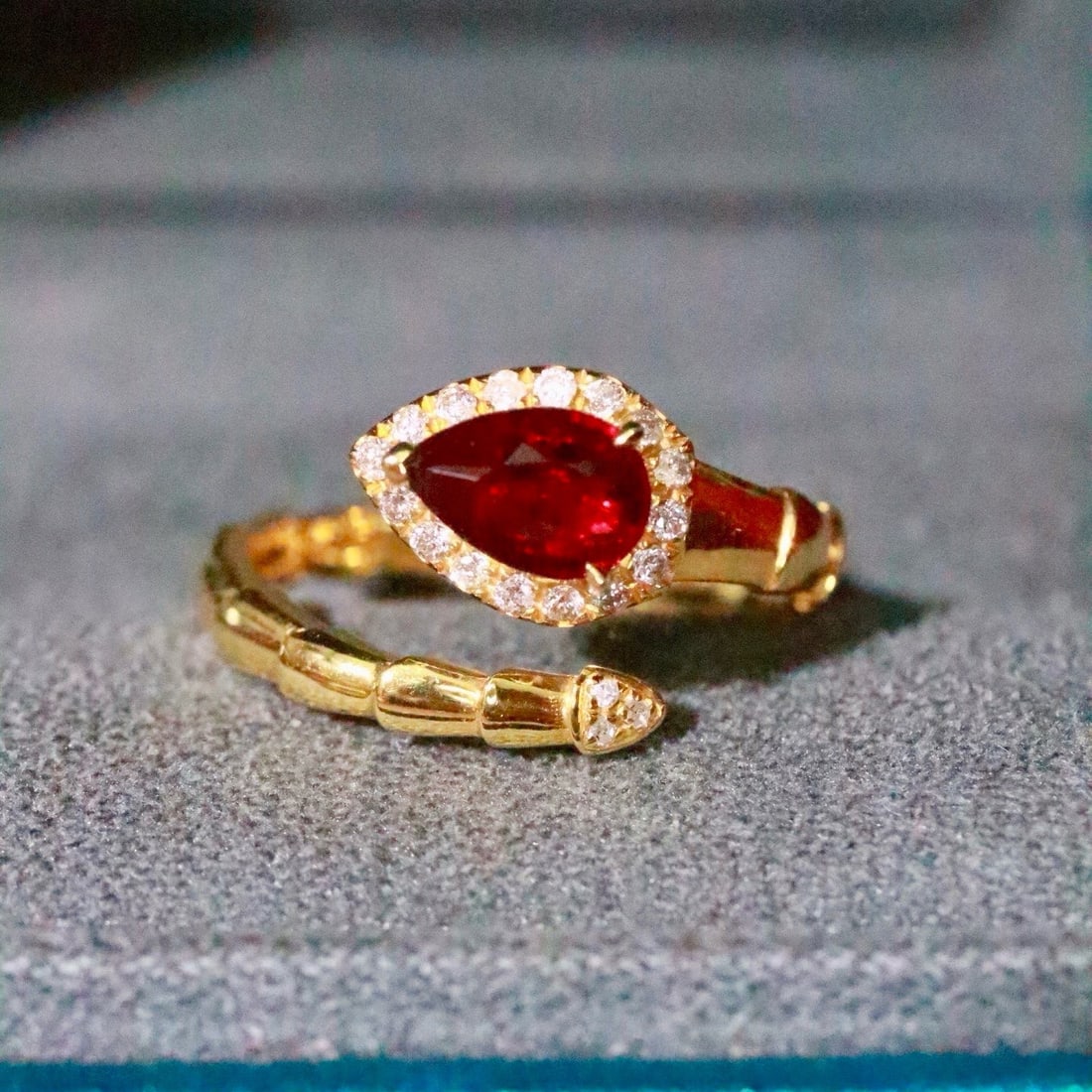 14k Gold 1.04 Ctw Natural Ruby & Diamond Ring: Ref:231170431 // gold content:14k gold // ring size:7. 25us // // main gemstone:ruby // shape:pear // carat weight:0. 90ct // color:red // treatment:natural // // adjacent gemstone 2 : diamond //