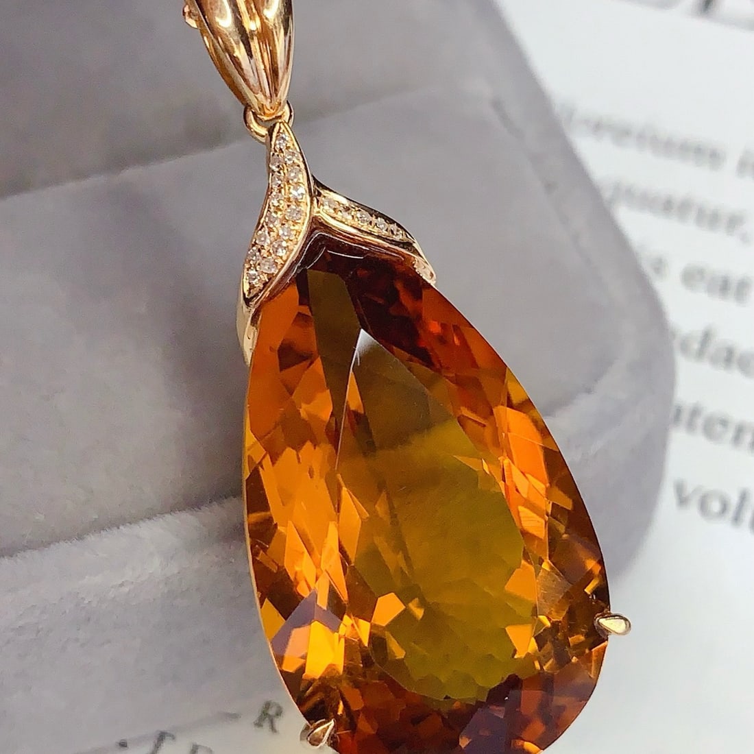 14k Gold 25.85 Ct Natural Citrine & Diamond Pendant( Without Chain ): Ref:231170434 // gold content:14k gold // main gemstone:citrine // shape:pear // carat weight:25. 85ct // color:yellow // treatment:natural // // adjacent gemstone 2 : diamond // number of stones:20