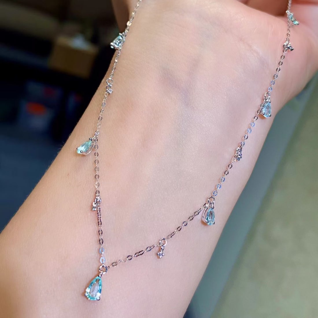 14k Gold 0.78 Ctw Natural Paraiba Tourmaline & Diamond Necklace: Ref:231167110 // gold content:14k gold // main gemstone:paraiba tourmaline // shape:pear // carat weight:0. 66ct // color:blue // treatment:natural // // adjacent gemstone 2 : diamond // shape:round /