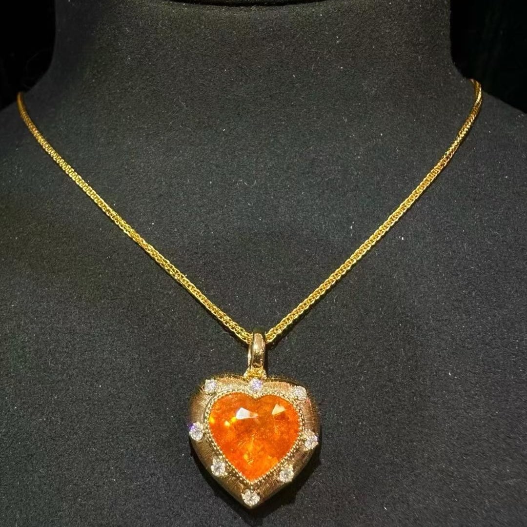 14k Gold 6.02 Ctw Natural Spessartine & Diamond Pendant( Without Chain ): Ref:231167209 // gold content:14k gold // main gemstone:spessartine // shape:heart // carat weight:5. 78ct // color:orange // treatment:natural // // adjacent gemstone 2 : diamond // shape:round //