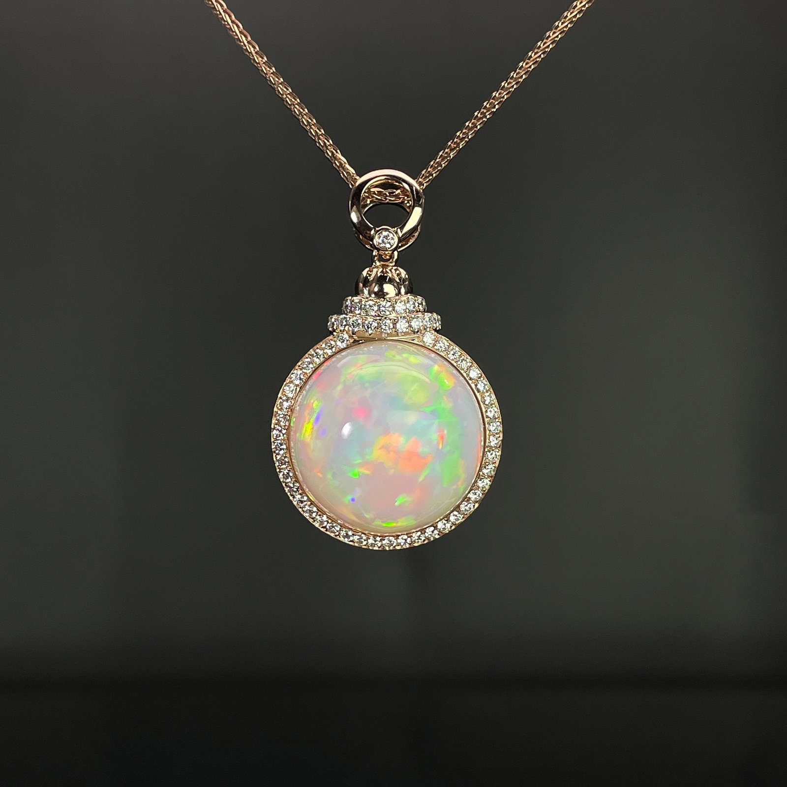 14k Gold 14.85 Ctw Natural Opal & Diamond Pendant( Without Chain ): Ref:231168021 // gold content:14k gold // main gemstone:opal // shape:round // carat weight:14. 2ct // color:color // treatment:natural // cut grade:g // // adjacent gemstone 2 : diamond //