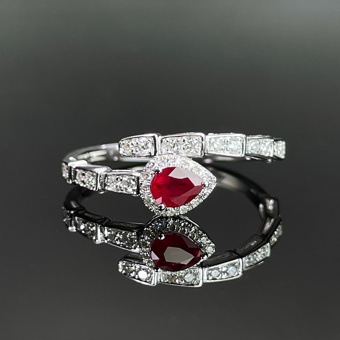 14k Gold 0.47 Ctw Natural Ruby & Diamond & Snake Ring: Ref:231168025 // gold content:14k gold // ring size:7. 25us // // main gemstone:ruby // shape:pear // carat weight:0. 3ct // color:red // treatment:natural // // adjacent gemstone 2 : diamond //