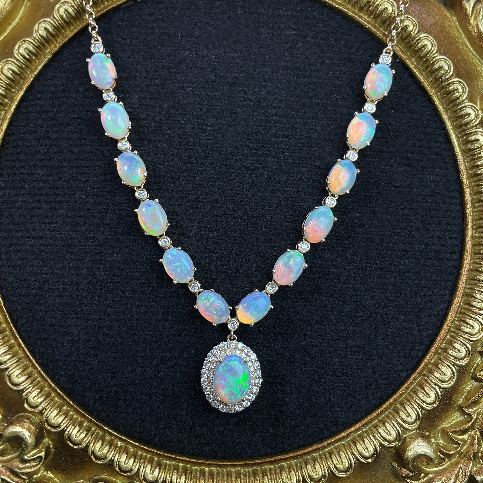 14k Gold 5.84 Ctw Natural Opal & Diamond Necklace: Ref:231168039 // gold content:14k gold // main gemstone:opal // shape:oval // carat weight:5. 4ct // color:color // treatment:natural // // adjacent gemstone 2 : diamond // shape:round // carat weight