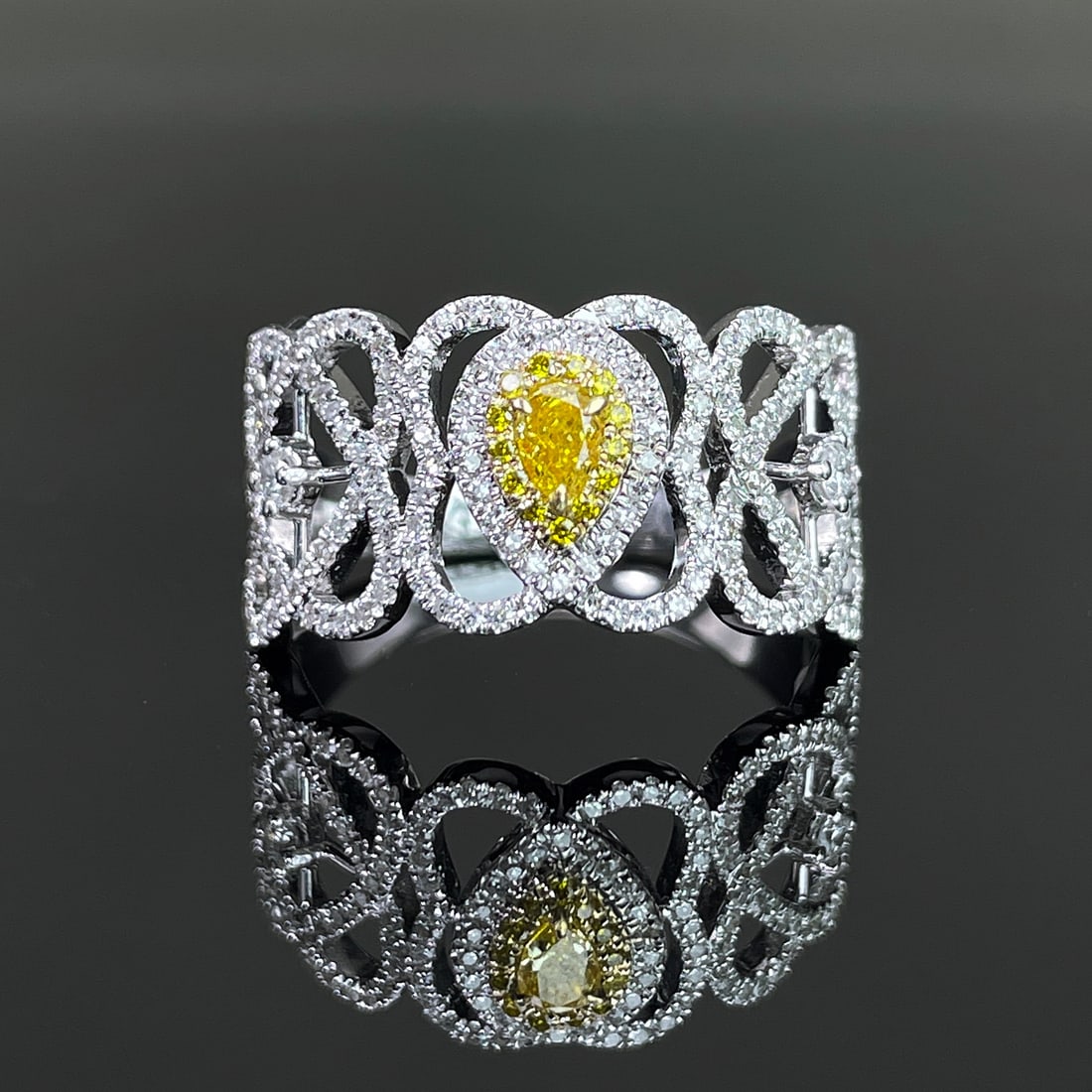 14k Gold 0.57 Ctw Natural Yellow Diamond & Diamond Ring: Ref:231168051 // gold content:14k gold // ring size:7. 25us // // main gemstone:yellow diamond // shape:pear // carat weight:0. 11ct // color:yellow // treatment:natural // // adjacent gemstone 2 :