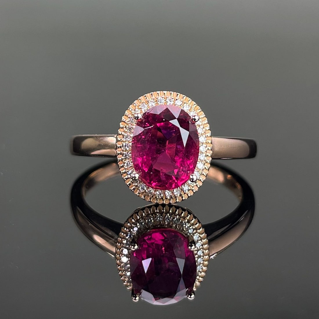 14k Gold 1.7 Ctw Natural Tourmaline & Diamond Ring: Ref:231168095 // gold content:14k gold // ring size:7. 25us // // main gemstone:tourmaline // shape:oval // carat weight:1. 6ct // color:red // treatment:natural // // adjacent gemstone 2 : diamond //