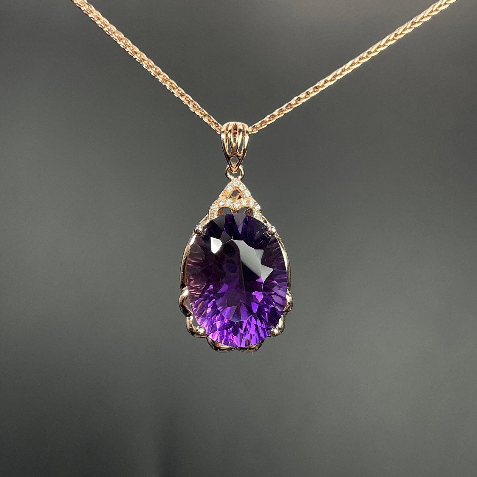 14k Gold 9.29 Ctw Natural Amethyst & Diamond Pendant( Without Chain ): Ref:231168111 // gold content:14k gold // main gemstone:amethyst // shape:oval // carat weight:9. 25ct // color:purple // treatment:natural // // adjacent gemstone 2 : diamond // shape:round // carat 