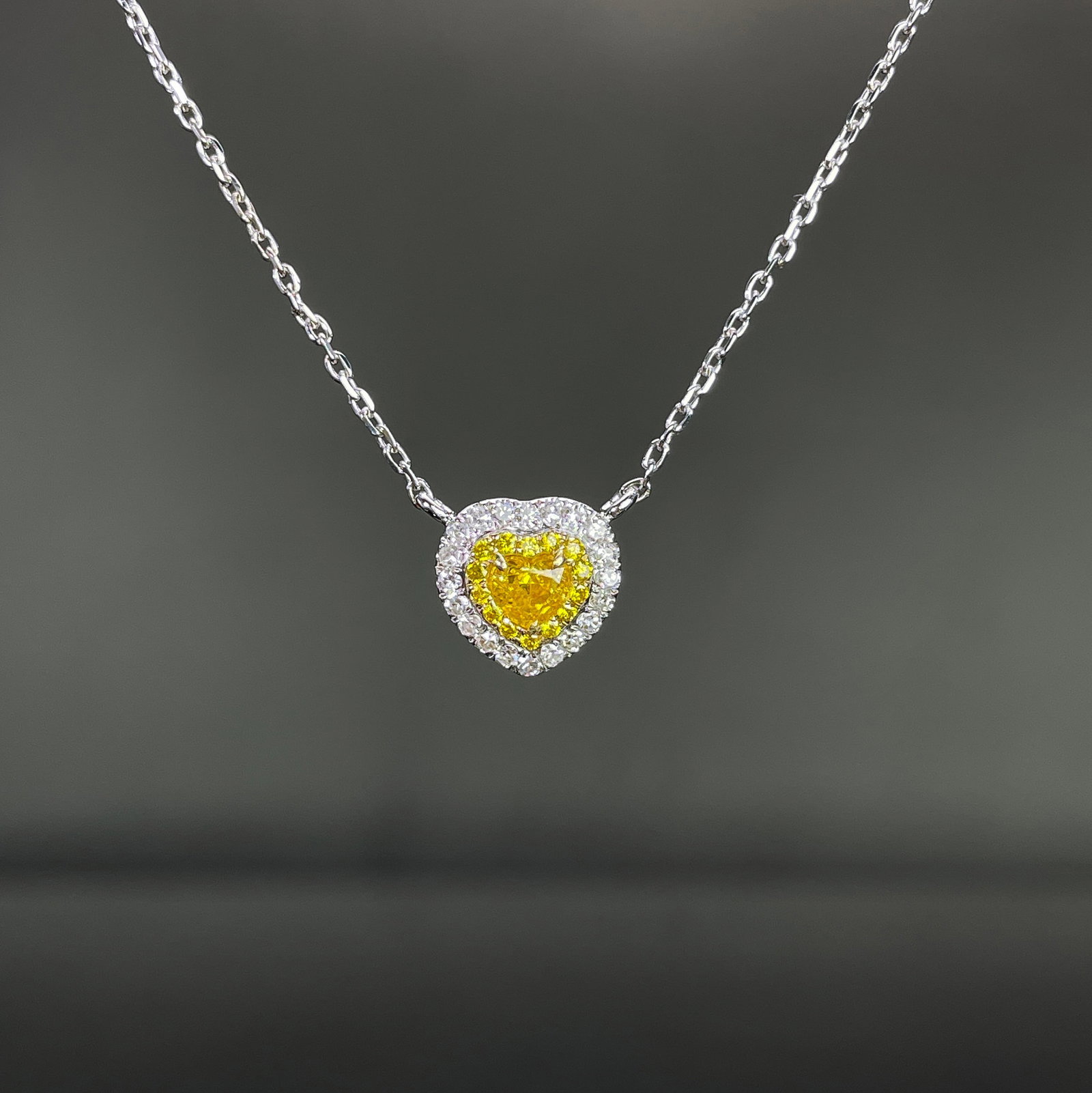 14k Gold 0.36 Ctw Natural Yellow Diamond & Diamond Necklace: Ref:231168128 // gold content:14k gold // main gemstone:yellow diamond // shape:heart // carat weight:0. 23ct // color:yellow // treatment:natural // // adjacent gemstone 2 : diamond // shape:round