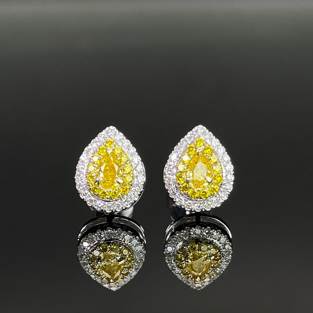 14k Gold 0.52 Ct Natural Color Diamond Earrings: Ref:231168134 // gold content:14k gold // main gemstone:diamond // shape:multiple // carat weight:0. 52ct // clarity grade:vs-si // color:color // treatment:natural // Condition: New Low Estimate:
