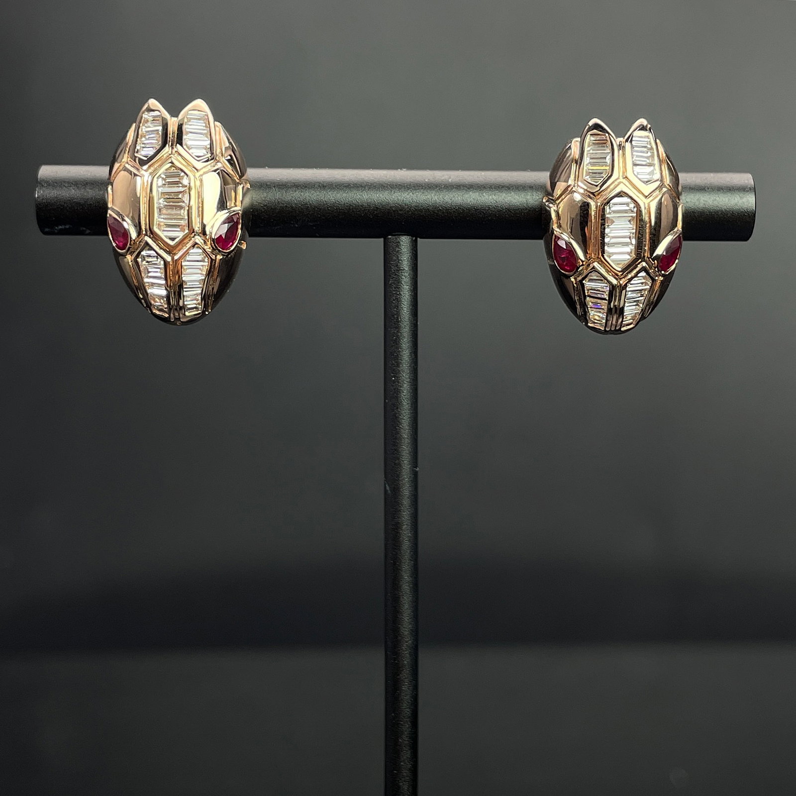 14k Gold 0.7 Ctw Natural Ruby & Diamond & Snake Earrings: Ref:231168141 // gold content:14k gold // main gemstone:ruby // shape:pear // carat weight:0. 3ct // clarity grade:vs2 // color:red // treatment:natural // // adjacent gemstone 2 : diamond //