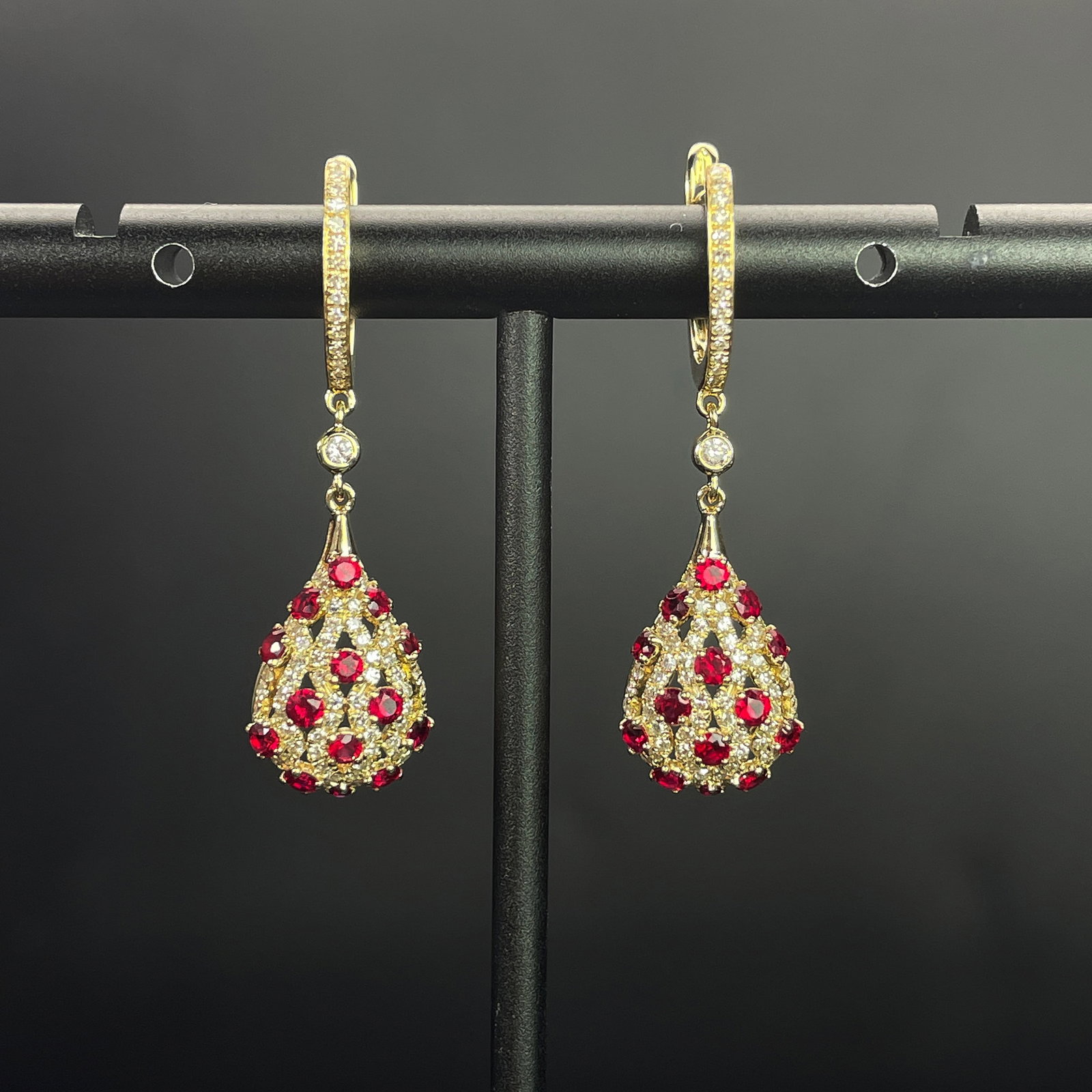 14k Gold 2.42 Ctw Natural Ruby & Diamond Earrings: Ref:231168157 // gold content:14k gold // main gemstone:ruby // shape:round // carat weight:1. 82ct // color:red // treatment:natural // cut grade:g // // adjacent gemstone 2 : diamond // shape:round 