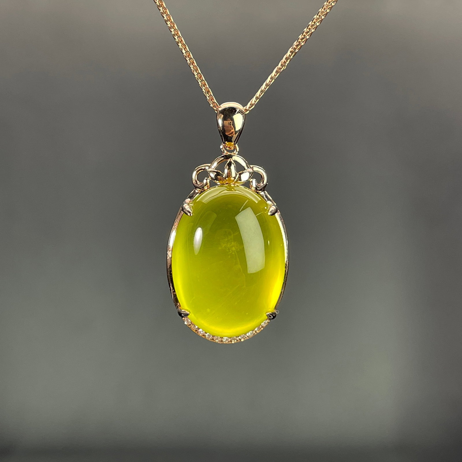 14k Gold 23.80 Ctw Natural Prehnite & Diamond Pendant( Without Chain ): Ref:231168190 // gold content:14k gold // main gemstone:prehnite // shape:oval // carat weight:23. 72ct // color:yellow // treatment:natural // // adjacent gemstone 2 : diamond // shape:round //